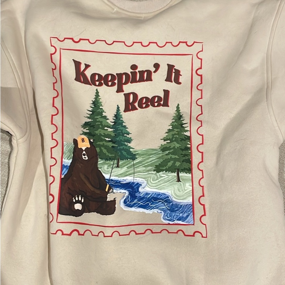 Keepin' It Reel Cream Sweatshirt